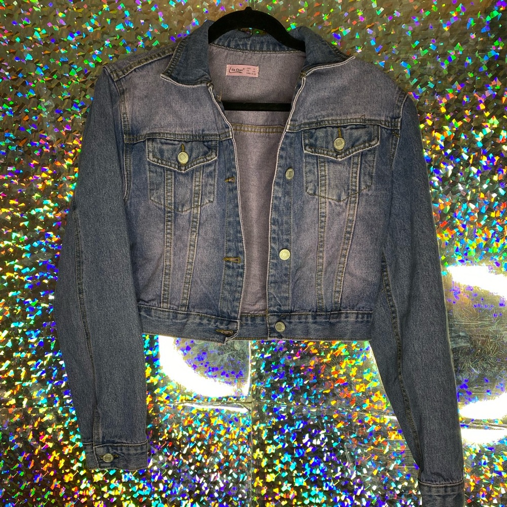 Pink colored denim jacket